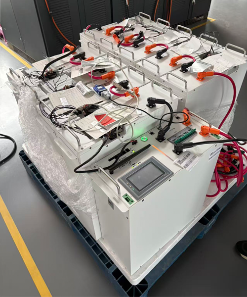 GRHV rack-mounted battery inside a data center server room, providing backup power to server racks with cabling and network equipment visible