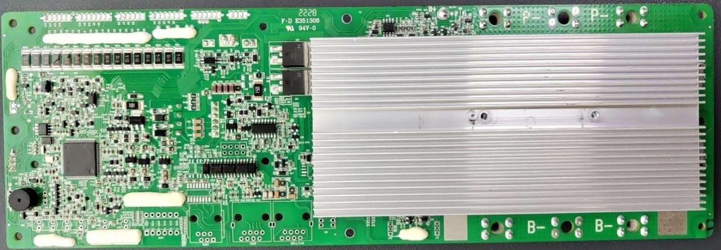 CMX 48V BMS board rear view showing MOSFETs, aluminium heatsink, MCU and main battery terminals